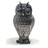 Antique novelty silver owl pepper green glass eyes measures approx 8.5cm tall