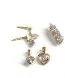 Selection of 9ct gold zircon pendants 3.4g