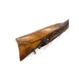 Antique Flintlock hunting rifle the stock carved with boars head