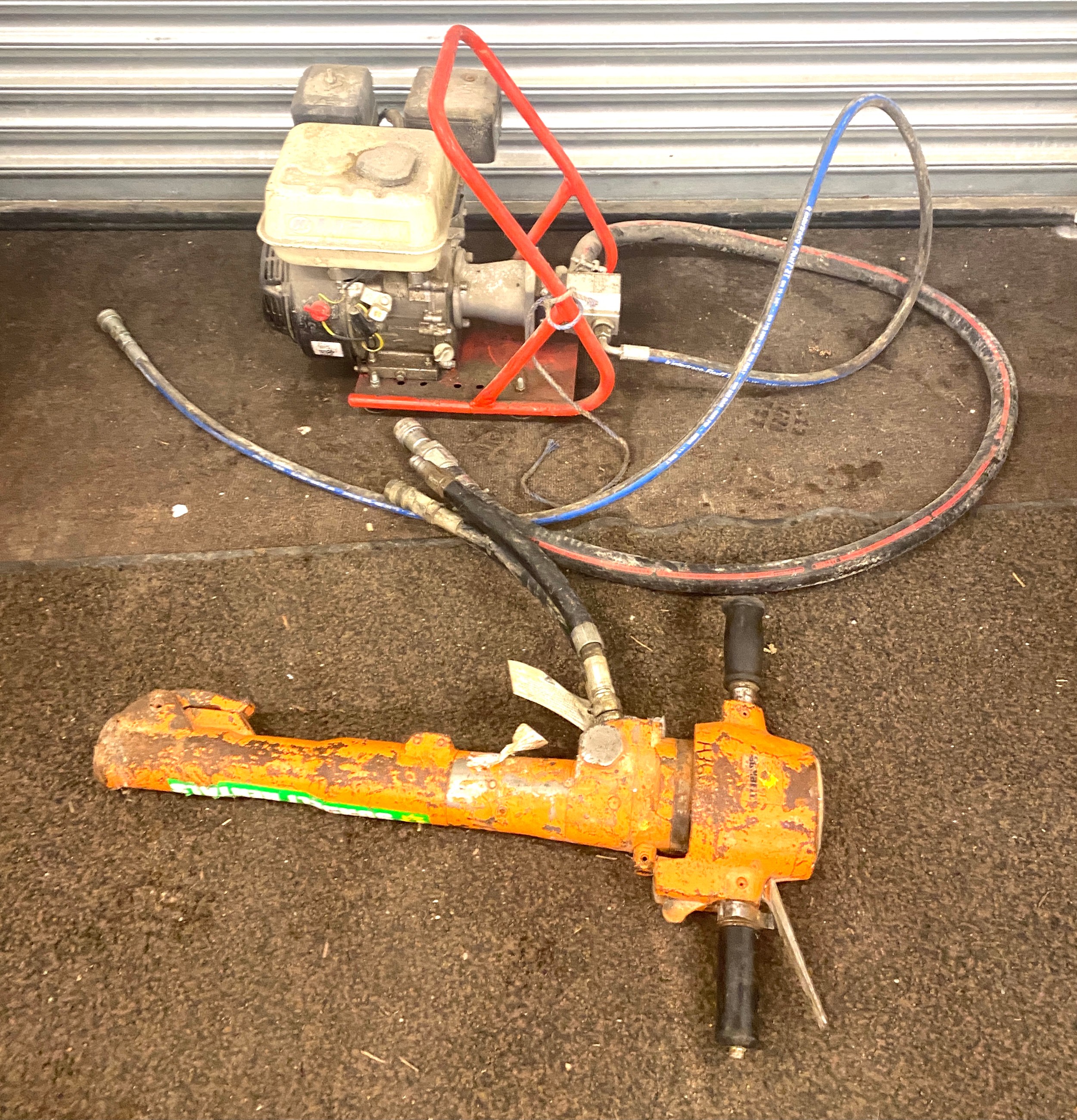 Hydraulic breaker and a generator