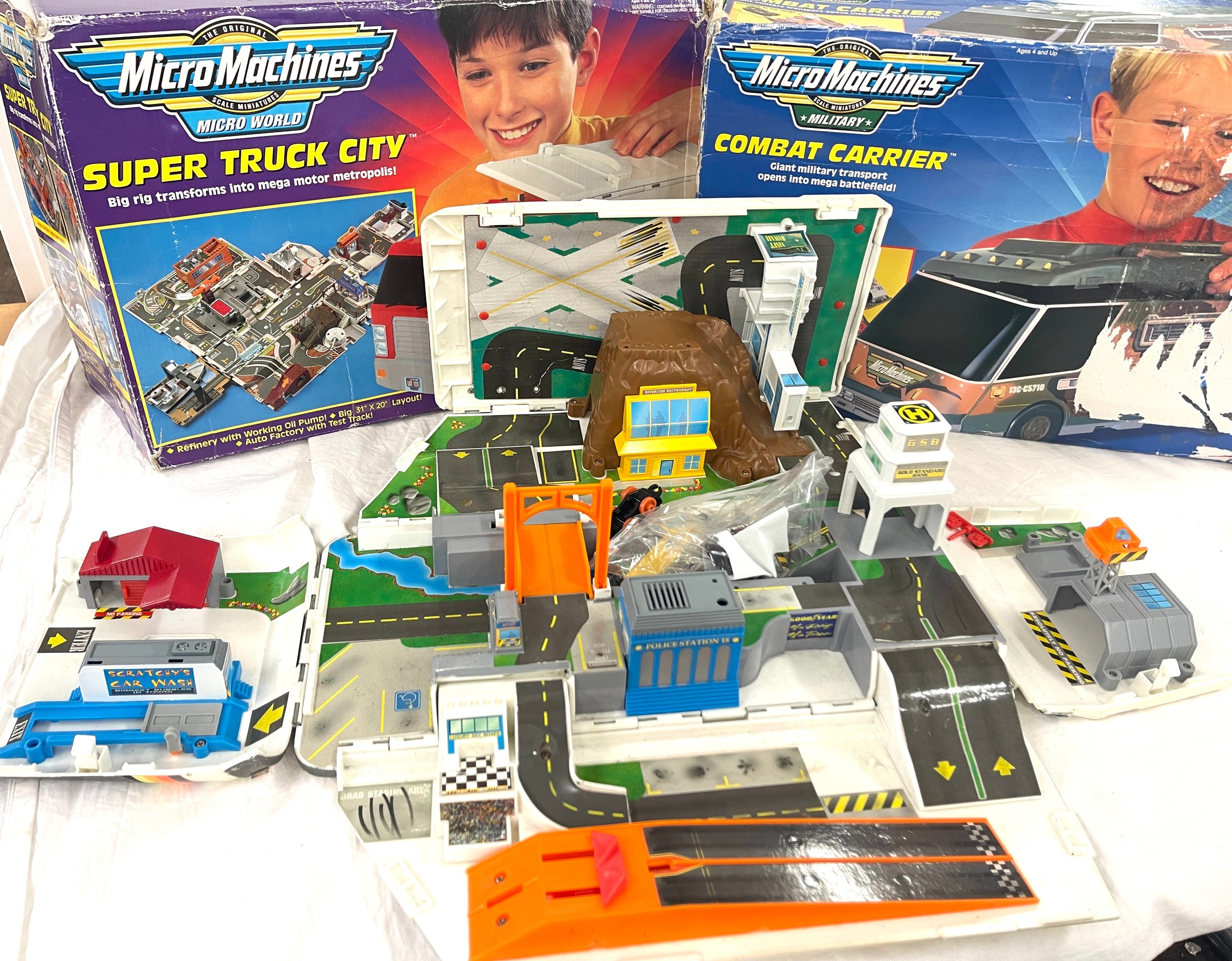 3 Micro machines, (2 in original boxes) , Super truck city, combat carrier, micro machines car