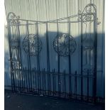 Pair of large black wrought iron drive way gates, each gate measures measures approx 68" tall 72"