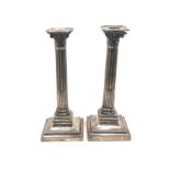 Pair of silver Corinthian candlesticks measure approx 24cm high Sheffield silver hallmarks age