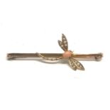 An antique 9 carat gold coral & pearl dragonfly brooch; 67 mm long . 5.6 grams.