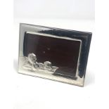 Silver cherub picture frame measures approx 17cm by 13cm