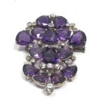 A vintage 18ct white gold Diamond & amethyst brooch; set with bright heart shaped amethysts and