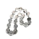 An antique polished rock crystal orb pool of light necklace, silver fittings With a matching pair of