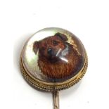 An antique 15ct gold essex crystal stickpin set with a hand carved Essex crystal reverse-painted