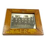 Scots Guard / Royal Interest: An oak frame with photograph commemorating the visit of HRH Duke of