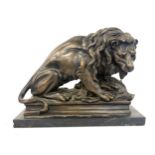 20th century bronze lion with wild boar kill sculpture on black marble plinth, approximate plinth