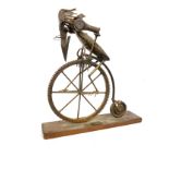 Mounted penny farthing metal cog sculpture, approximate measurements: Height 19.5 inches, Width of