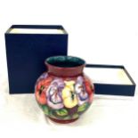 Vintage Moorcroft Pansy vase, signed to base William Moorcroft, together with box, approximate