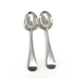 Pair of antique silver serving spoons London silver hallmarks each measure approx 21.5cm long