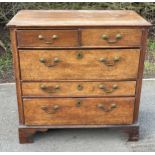 Early 18c oak 2 over 3 draw chest, approximate measurements: Height 33.5 inches, Width 34.5