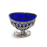 Antique silver salt with blue glass liner measures approx 8cm by 6cm height 6.5cm