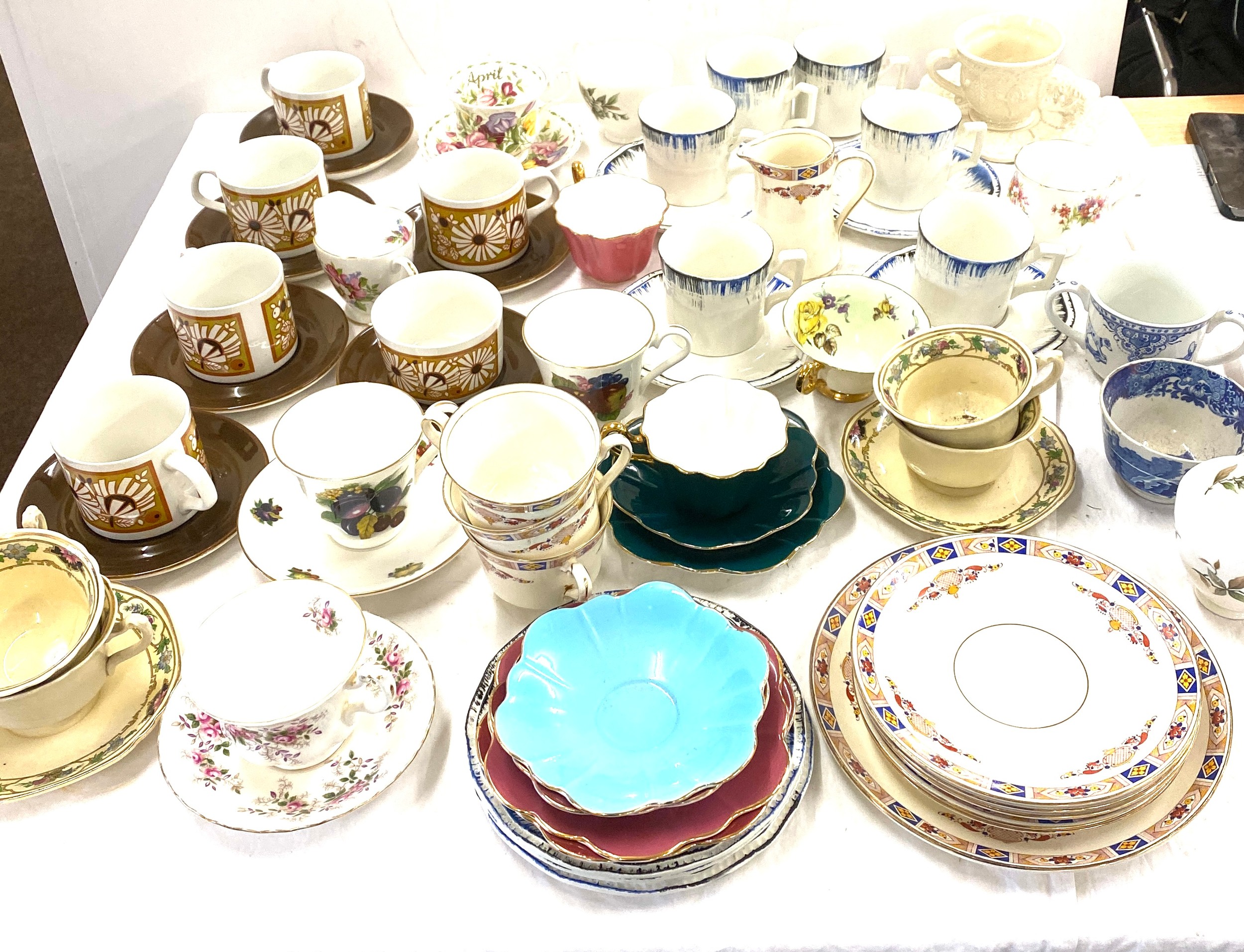 Large selection of assorted cups and saucers some named