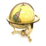 Table top gemstone world globe with 3 legged gold tone stand and compass height 20" tall