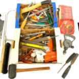 Large selection of vintage tools includes hammer, saws, axe etc