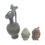 Bronze metal buddha head hollow, resin buddha figure and a metal dragon water jug