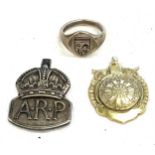 Hallmarked silver pieces to include a ARP cap badge, silver darts medal, silver signet ring, total