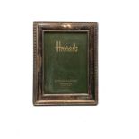 Vintage Harrods Silver picture frame measures approx 16cm by 12.5cm