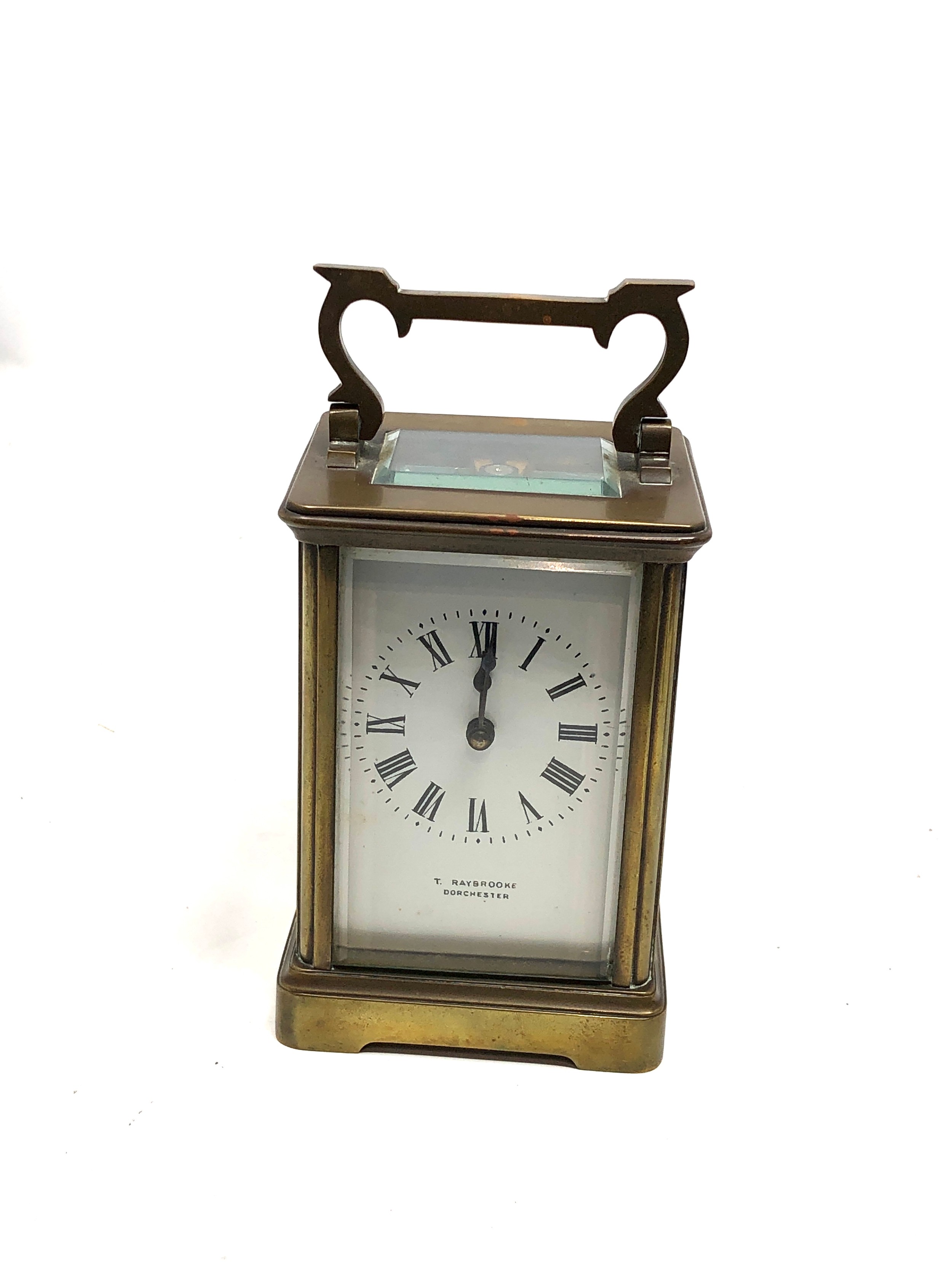 Brass carriage clock retailed by t raybrooke dorchester clock is ticking