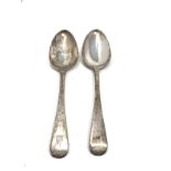pair of georgian crested silver serving spoons London silver hallmarks measure approx 21.5cm long