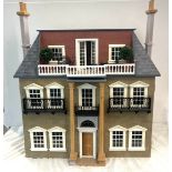 Large dolls house together with selection of dolls house furniture, house measures approximately