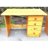 4 Draw pine desk, approximate measurements: Height 31 inches, width 44 inches, Depth 24 inches