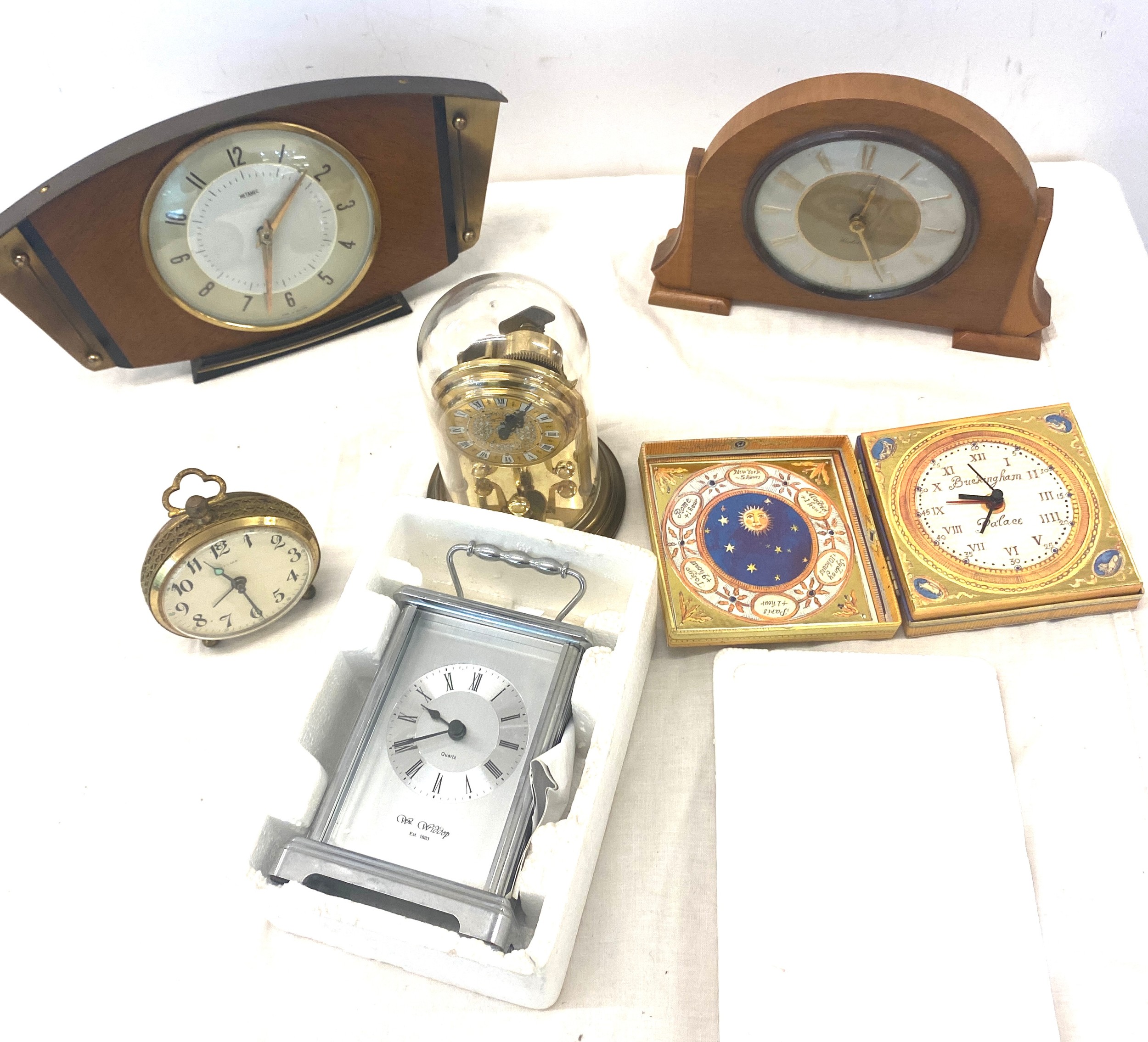 Selection of assorted clocks includes mantel clocks, carriage clocks etc