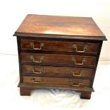 4 drawer flamed mahogany miniature chest, approximate measurements: Height 17 inches,