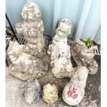 Selection of 8 concrete garden ornaments