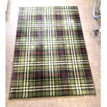 Tartan style lounge rug measures approx 92" long 64" wide by fleur rugs