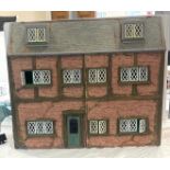 Large dolls house together with large selection of dolls house furniture, house measures