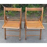 2 Ikea wooden folding chairs