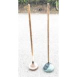 2 vintage Dolly plungers