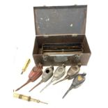 Metal tool chest with a selection of oil cans grease guns etc