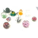 Selection of glass paper weights includes Madina, Langham etc