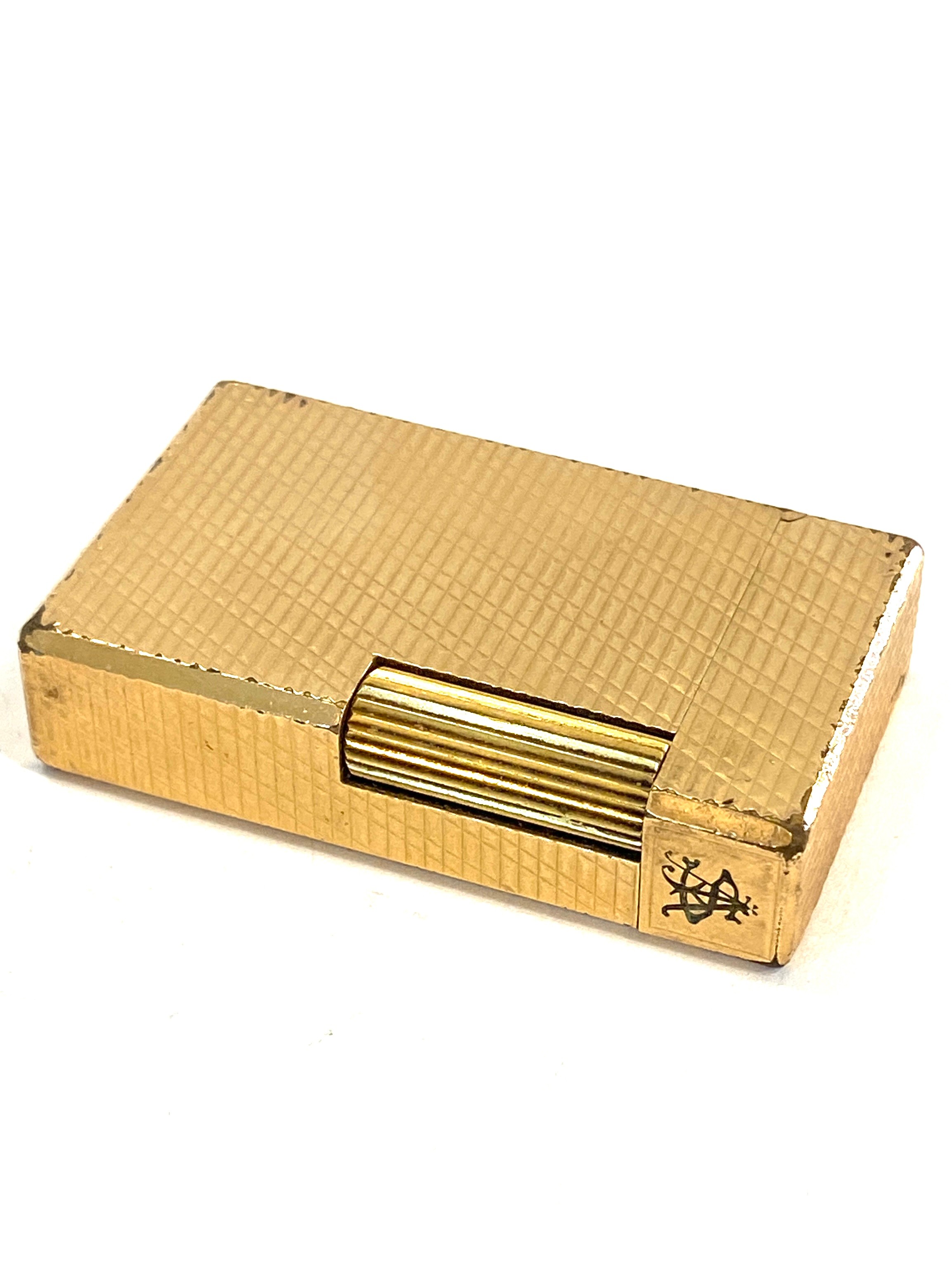 Gold plated cigarette lighter by Dupont Paris