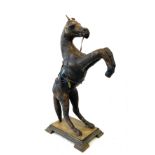 Vintage leather prancing horse on stand, approximate overall height: 17 inches