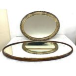 2 framed oval mirrors, largest frame measures approximately 27.5 x 17 inches