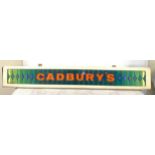 Metal and perspex light up Cadburys advertising sign, in need of re-wiring, approximate length 36