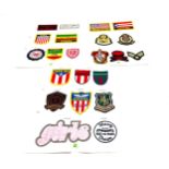 Selection of assorted fabric cap badges