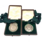 2 antique hallmarked silver arbroath high scool awards in original fitted cases named to rowland p