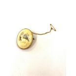 Vintage carved 9ct gold mounted brooch, deer carving, measures approx 4cm by 3cm