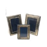 3 Vintage silver picture frames largest measures approx 18cm by 14cm