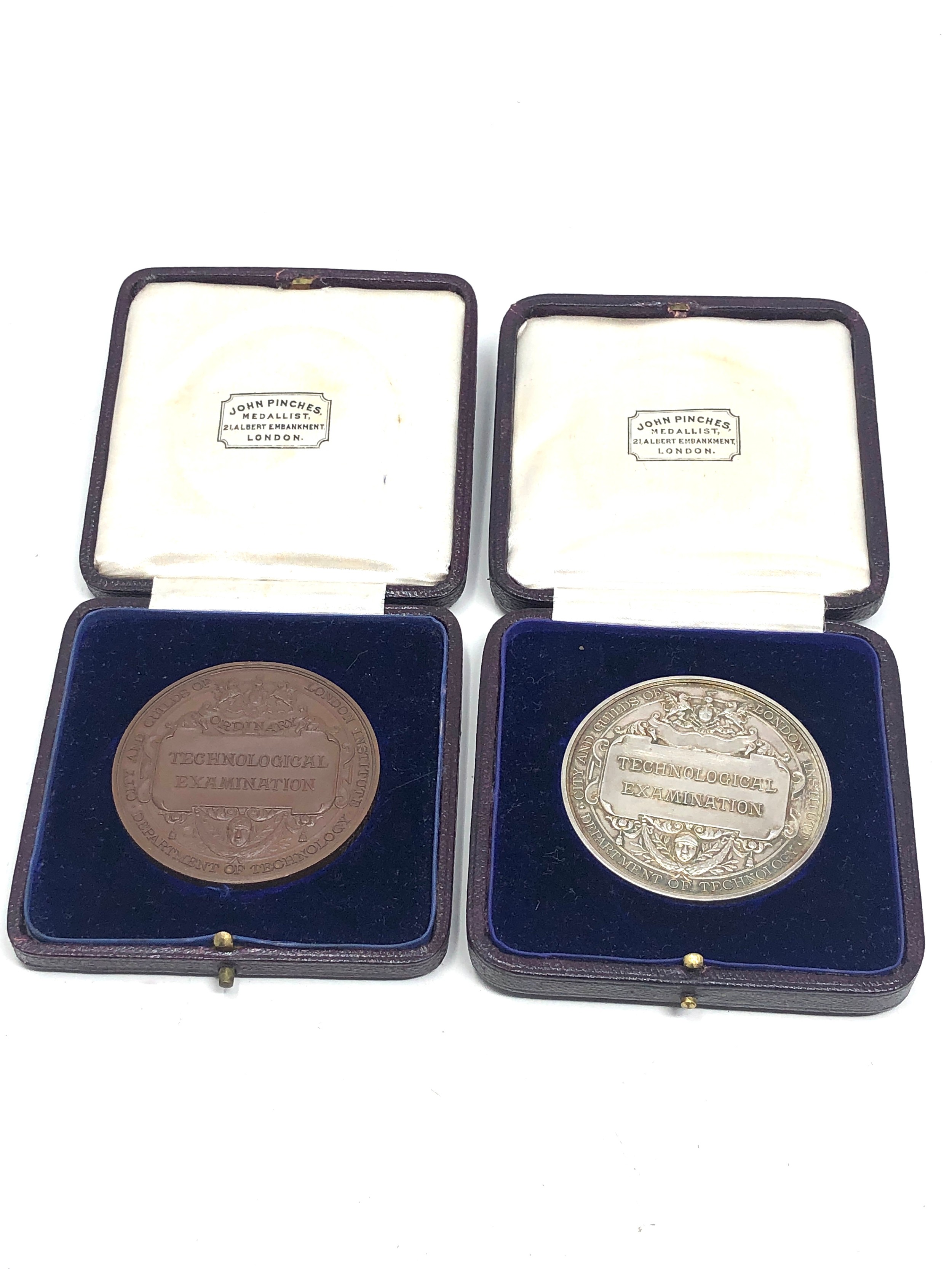 2 boxed 1911 -12 city & guild silver & bronze medals silver medal weight 76g