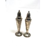 Pair of vintage sterling silver glass lined peppers each measure approx 15.5cm high weight 250g