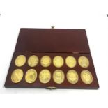 Boxed the arms of the prince of wales 925 silver ingots plated in 22ct gold ingot weight 168g