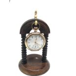 Waltham rolled gold pocket watch on rosewood stand